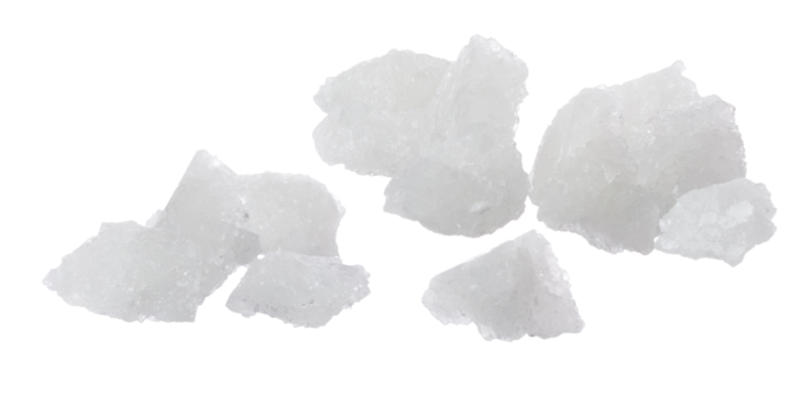 Rock Sugar flying explosion, white crystal Rock Sugar abstract cloud floating. Big Rock Sugar splash throwing in air. white background isolated high speed freeze motion