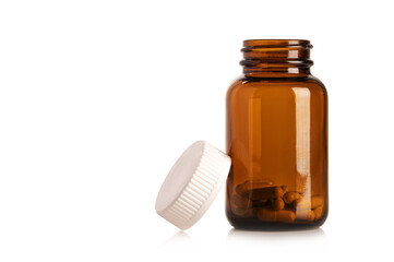 Bottle of medicine on white background.