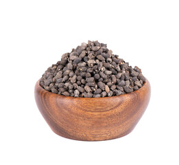 Borage seeds in wooden bowl, isolated on a white background. Borago officinalis seeds.