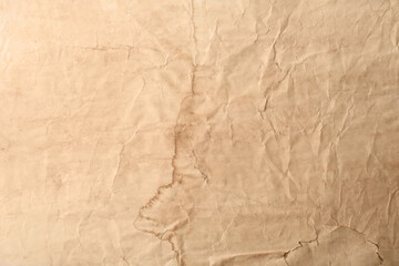 Sheet of old parchment paper as background, top view