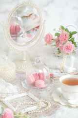 still life macaroon, tea, candle. brightmood concept