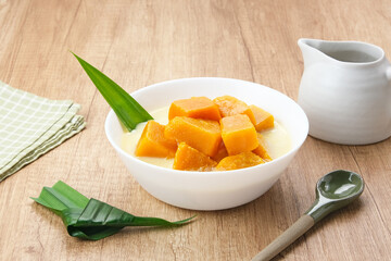 Kolak Waluh or Kolak Labu Kuning, Indonesian traditional food. Pumpkin in sweet coconut milk. Popular during ramadan
