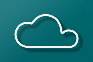 White paper cut out speech bubble shape set on green paper background.