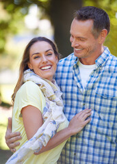 True feelings can never be hidden. Portrait of an affectionate couple outside in the summer sun.