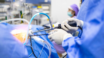Doctor or Surgeon did laparoscopic or endoscopic minimal invasive surgery inside operating room in...