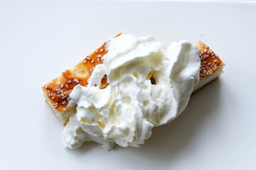 slow motion Full HD 240fps cream poured on cheesecake cottage cheese casserole homemade cake delicious breakfast Healthy food calcium for kids beautiful dessert sprinkled with sesame seeds