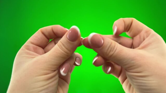 Two at the same time snap your fingers Close up. hand snapping hand gesture isolated on green background with copy space for place a text message for advertisement, and promote your brand and product