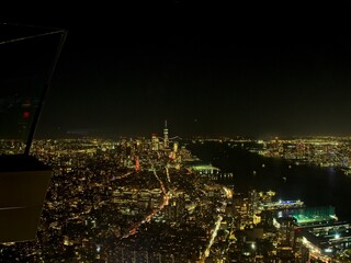 The lights of Manhattan glow bright, as seen from Edge, an observation deck atop a high rise at Hudson Yards