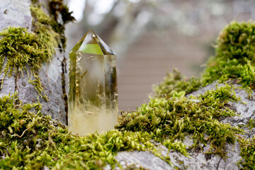 An image of a clear citrine crystal tower used in Reiki and energy healing. 