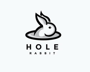 Fototapeta premium simple drawn art rabbit bunny hide in hole logo icon symbol design template illustration inspiration