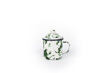 A vintage green and white cup isolated on white background