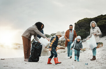 Beach cleaning, trash and children, family or volunteering group in education, learning and community support. Grandparents, people and kids helping with plastic waste or garbage for pollution action