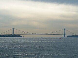 The Verrazzano-Narrows Bridge crosses the mouth of New York Harbor between the boroughs of Brooklyn and Staten Island