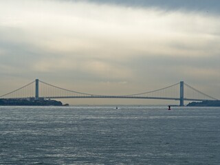 Fototapeta premium The Verrazzano-Narrows Bridge crosses the mouth of New York Harbor between the boroughs of Brooklyn and Staten Island