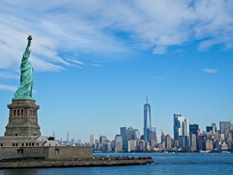 The Statue of Liberty sits on Liberty Island in the New York Harbor. It was once a beacon of hope for immigrants arriving by steamship into the United States