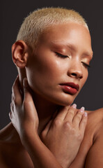Face of black woman, dark studio and makeup, platinum hair and beauty isolated on grey background....