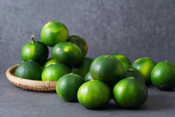 Fresh tangerines on gray background