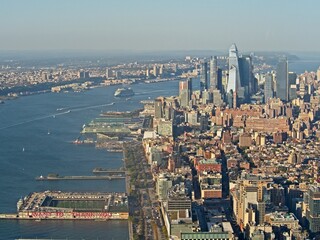 Looking out on Manhattan towards Hudson Yards from atop the One World Observatory at One World Trade Center, the tallest building in the Western Hemisphere rising to a symbolic 1,776 feet