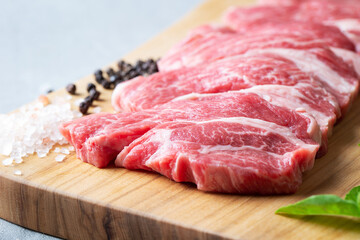 fresh raw meat on cutting board	