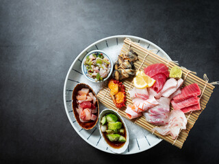 Tuna sashimi, sea bream sashimi, and various seafood