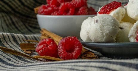 fresh goat cheese balls with raspberries