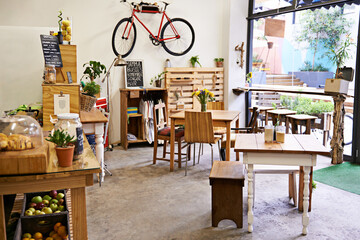 Its a coffee shop you can call home. Interior of a quaint contemporary coffee-shop.