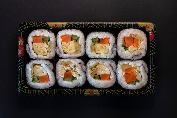 Sushi roll on oriental platter