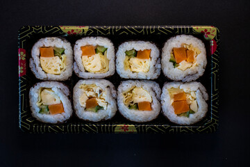 Sushi roll on oriental platter