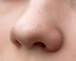 Nose on the girl's face.