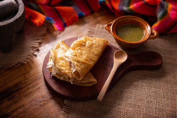 Potato quesadillas. Fried quesadillas made with corn tortillas, they can be filled with any dish or ingredient, such as meat, potato or fish such as marlin or tuna, popular during the Lenten season.