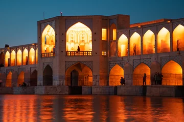 Fotobehang Khaju Brug Isfahan, Iran - 15th june, 2022: Old Khajoo bridge at night, across the Zayandeh River in Isfahan, Iran.