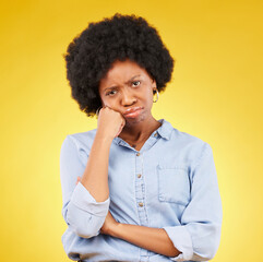 Fototapeta na wymiar Black woman, sad face and portrait in studio upset, sulking and disappointed on a yellow background. African female model with fatigue, problem or mental health with afro hair and color space