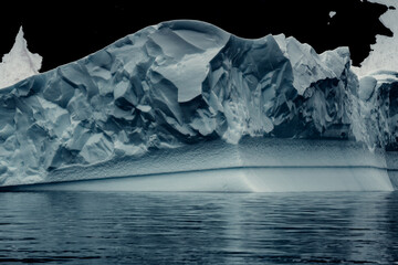 Massive Iceberg In Antarctica Looks Textured with Moody Colors