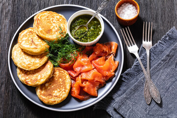 pancakes with sliced cold smoked salmon, top view