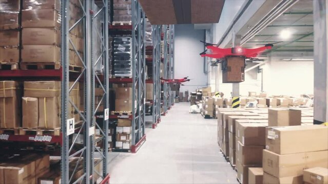 Group of delivery drones flying at warehouse 