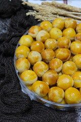 Nastar or pineapple tart is a small, bite-size tart filled or topped with pineapple jam. Popular cookie in Southeast Asia during festive occasions of Eid, Christmas, Chinese New Year and Deepavali.