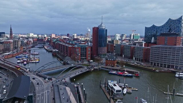 Drone shot revealing Elbphilharmonie (concert hall) , German harbor Hafen city , Elbe River , Hamburg , Germany