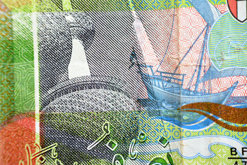 A closeup from the obverse side of Kuwaiti half dinar green paper banknote cash money bill currency...