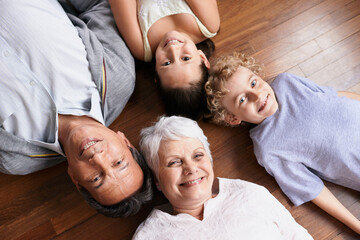 We love getting to see our grandkids. High angle view of a brother and sister bonding with their...