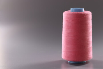 Threads of light pink color in coil