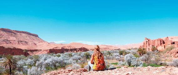 Woman tourist looking at  Kasbah near Ait ben haddou,  Ouarzazate in Morocco