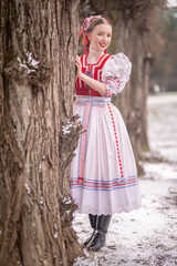 Beautiful woman wearing traditional Eastern Europe folk costumes. Slovak folk costumes.