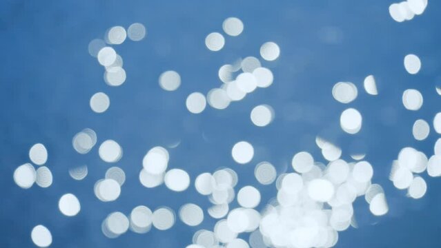 キラキラと光が煌めく水面　4K　スローモーション
