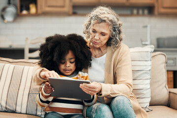 Online tablet, family grandmother and child e learning, remote education or youth development in home school. Senior woman, adoption and young kindergarten students with elearning knowledge software