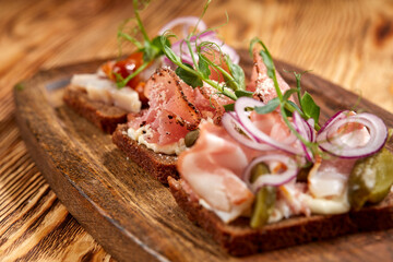 meat appetizer on the wooden background