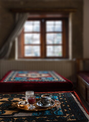 Fototapeta premium Coffee, Turkish delight, sherbet and water served in traditional Ottoman hospitality