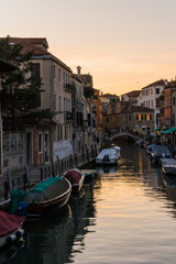 Fototapeta na wymiar Beautiful canal street in Venice, Italy in the evening