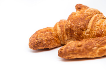 imagen detalle de un croissant tostado con azúcar por encima 