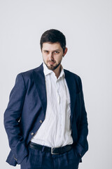 Portrait of a man in a business suit and white shirt