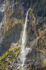 Staubbach falls waterfall in Lauterbrunnen village, Berner Oberland, Switzerland, Europe high angle view